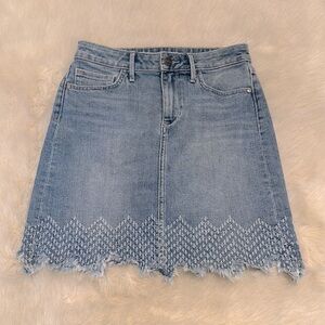 New with the tag attached to the shirt